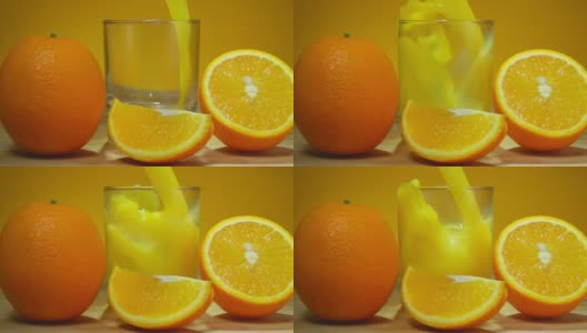 新鲜甜橙汁倒在一个玻璃杯里，旁边是成熟的橙子高清在线视频素材下载