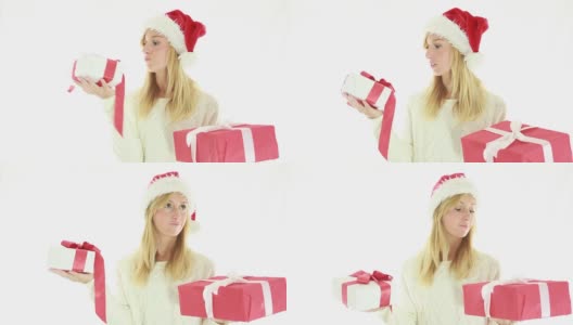 快乐的女人拿着圣诞礼物高清在线视频素材下载