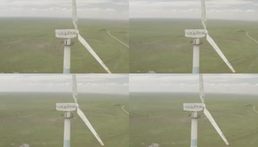 用于能源生产的强大风力涡轮机农场的鸟瞰图。风力涡轮机为可持续发展提供清洁的可再生能源。替代能源。4K DJI DLog-M颜色配置文件高清在线视频素材下载