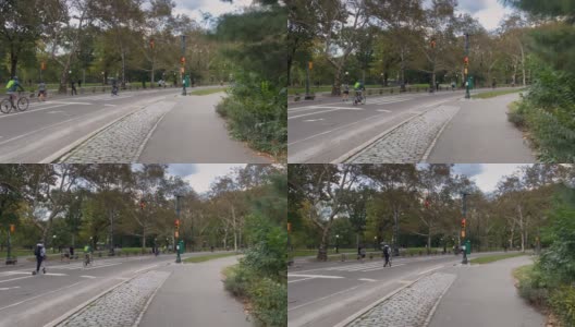 纽约中央公园。人们沿着小路散步，骑自行车，慢跑高清在线视频素材下载