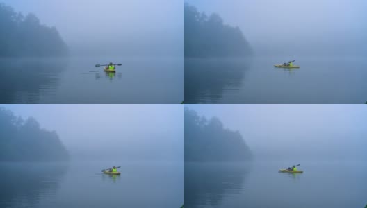 在雾蒙蒙的早晨划桨高清在线视频素材下载