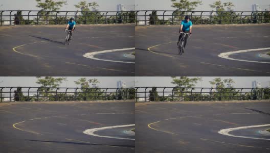 骑自行车的人在弯道上骑自行车的慢动作高清在线视频素材下载