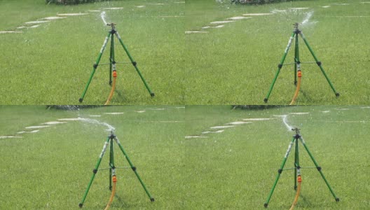 sprinkler在白天给公园草坪浇水高清在线视频素材下载
