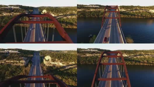 Pennybacker桥或360桥或首府德克萨斯州高速公路桥在日落科罗拉多河或镇湖春天时间空中直接飞过桥的顶部高清在线视频素材下载