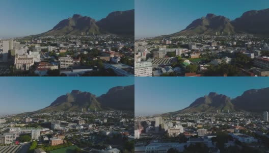 居民区和石峰在桌山国家公园。向前飞的城市街区。南非开普敦高清在线视频素材下载