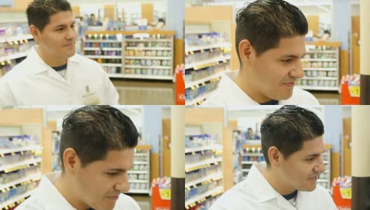中年西班牙裔药剂师在超市药房检查数字平板电脑的库存高清在线视频素材下载