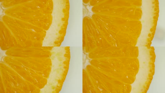 新鲜橙子切片水果旋转高清在线视频素材下载