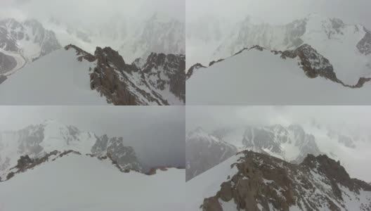 山顶上的登山者。天山,吉尔吉斯斯坦。鸟瞰图高清在线视频素材下载