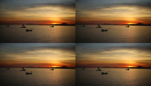 中国海南三亚，渔船在海上的夕阳灯光高清在线视频素材下载