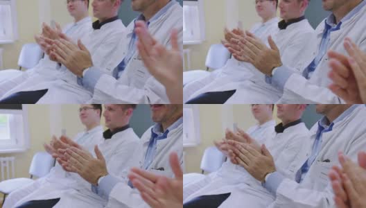 医务人员在医院开会时鼓掌高清在线视频素材下载