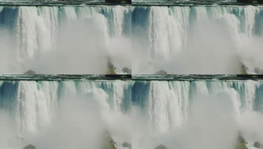 尼亚加拉瀑布的水墙和河上的桥。慢动作180帧/秒的视频高清在线视频素材下载