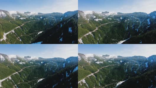 北喀斯喀特山贝克荒野森林步道在雪水平朝向高山空中直升机视图高清在线视频素材下载