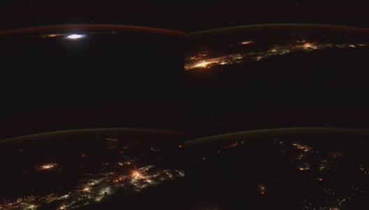在这段从太空拍摄的地球影像中，我们可以看到夜晚城市上空强烈的闪电。图片由美国宇航局约翰逊航天中心地球科学和遥感单元提供。由Rebus_Prod处理。高清在线视频素材下载
