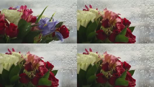 美丽的玫瑰花束，鸢尾和紫花旋转高清在线视频素材下载
