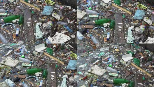 海面上的垃圾和瓶子表明海洋受到了污染高清在线视频素材下载