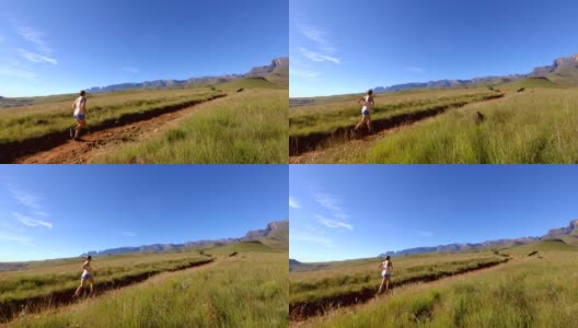 一个在山间小道上跑步的健康女人高清在线视频素材下载