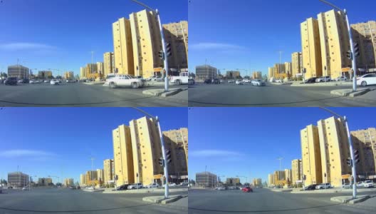 沙特国王路和阿卜杜勒-阿齐兹·伊本·穆赛迪本·贾拉维圣大街交叉口的交通繁忙高清在线视频素材下载