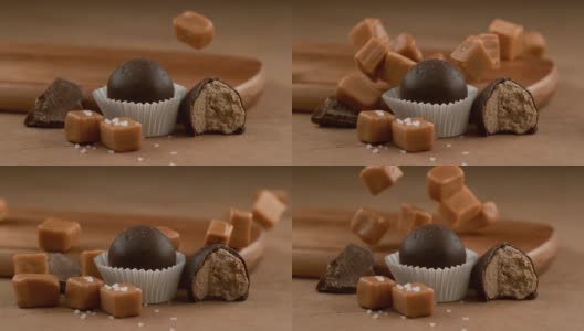咸味焦糖巧克力松露，配料以慢动作落下。使用幻影Flex 4K相机拍摄。高清在线视频素材下载