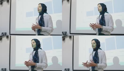 中东女商人带着头巾在商业会议上讲话高清在线视频素材下载