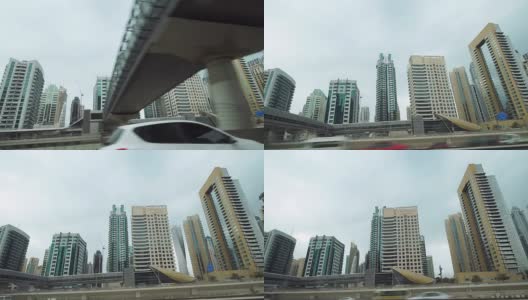 沿着迪拜的摩天大楼开车高清在线视频素材下载