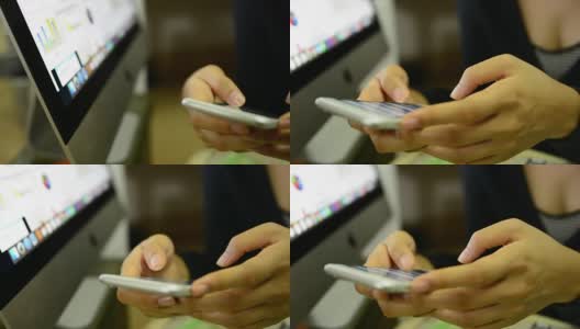 女性的手在用智能手机高清在线视频素材下载