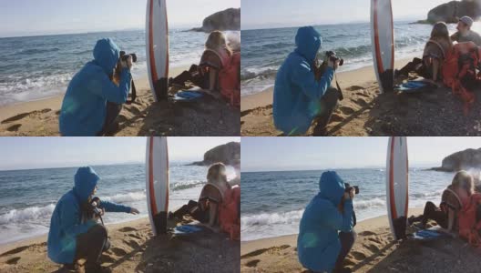 冲浪者在海滩上拍了4K的照片高清在线视频素材下载