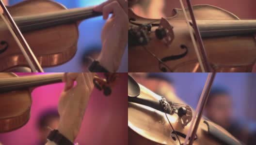 音乐会上一个男人拉小提琴的细节高清在线视频素材下载