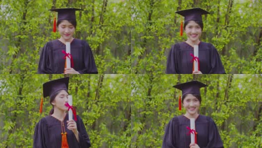迷人的亚洲女学生毕业，戴着帽子，穿着长袍，手拿证书，在毕业典礼上自豪地庆祝，祝贺学生毕业，教育成功高清在线视频素材下载