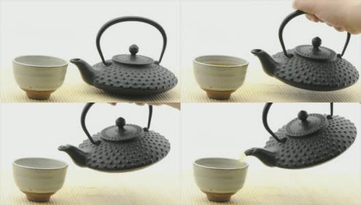从tetsubin茶壶倒绿茶-白色背景(HD720p)高清在线视频素材下载