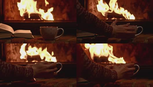 一个女人在壁炉边喝茶高清在线视频素材下载