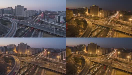 T/L WS HA PAN鸟瞰图繁忙的立交桥，白天到夜晚过渡/北京，中国高清在线视频素材下载