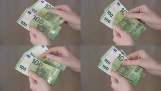 女性手数欧元钞票的特写镜头。高清在线视频素材下载