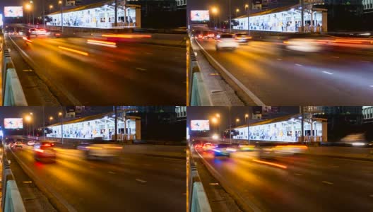 间隔拍摄长时间曝光。夜间，曼谷市中心灯火通明的车流高清在线视频素材下载