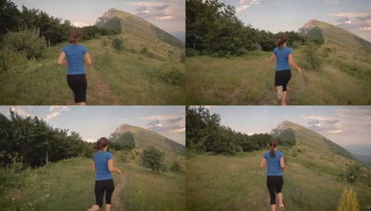 小女孩在山顶上奔跑，摄像机稳定拍摄高清在线视频素材下载