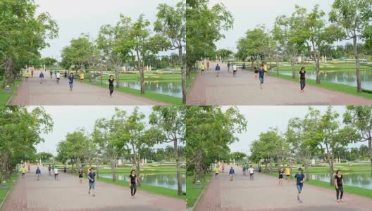 一群人在公园里跑步高清在线视频素材下载