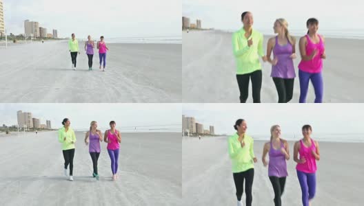 多民族的年轻女性在海滩上大力行走高清在线视频素材下载