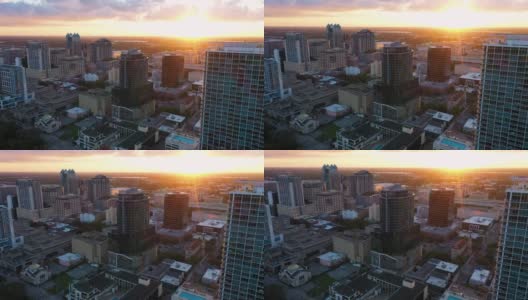 电影航拍视频剪辑在日落在市中心奥兰多天际线。高清在线视频素材下载