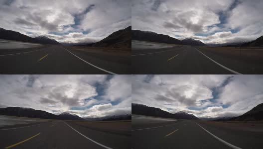POV从汽车，因为它俯冲沿山湖道路高清在线视频素材下载