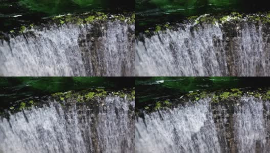 高清:瀑布。水在波浪中下落。高清在线视频素材下载