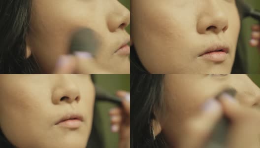 亚洲女人正在梳妆高清在线视频素材下载