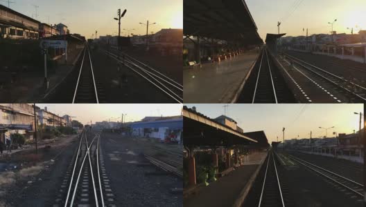 火车经过城市时，铁轨的向后镜头高清在线视频素材下载