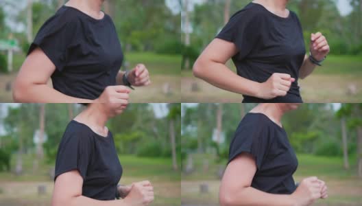 在公园慢跑的女人，特写高清在线视频素材下载