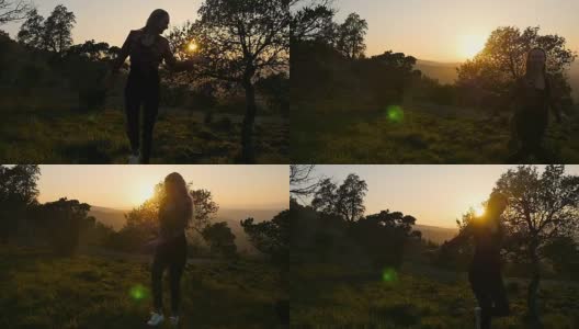 夕阳西下，一个女人缓缓地向山上爬去高清在线视频素材下载