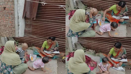 两名印度农村亚裔妇女和她们的孩子高清在线视频素材下载