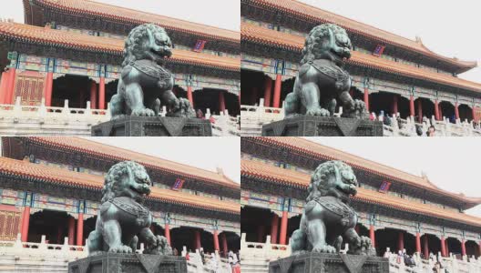 雪中北京故宫前的铜狮。高清在线视频素材下载