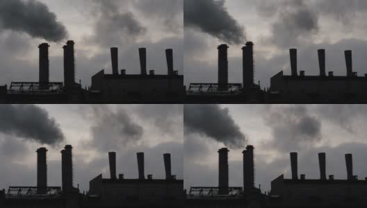 工厂大烟囱排放的烟尘对天空造成了环境污染高清在线视频素材下载