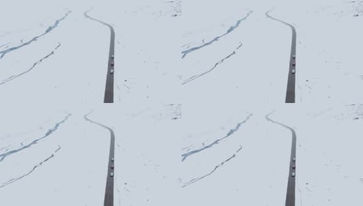 航拍车队穿过雪地的照片高清在线视频素材下载