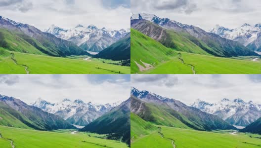 空中拍摄的新疆山脉和白色冰川的自然景观高清在线视频素材下载