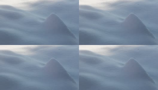柔软、蓬松的雪在地面上形成山峰高清在线视频素材下载