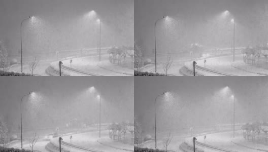 街灯下的暴风雪。危险的降雪高清在线视频素材下载